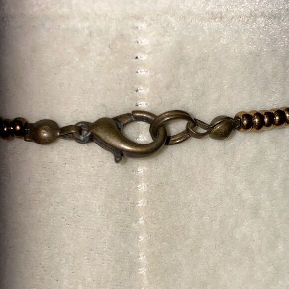 Vintage Boho Beaded Necklace with Drop Dangle Caged Bead Brown and Gold Accents - Picture 10 of 11